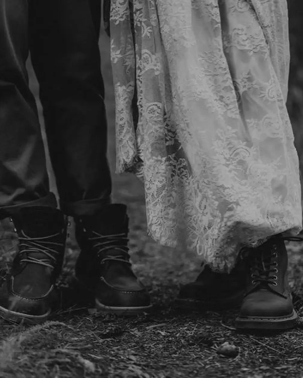 couple in hiking boots wedding colorado elopement boho lace wedding dress