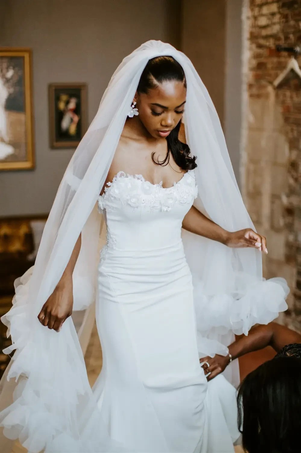 real bride getting dressed modern sleek tight wedding dress bridal shop kansas city